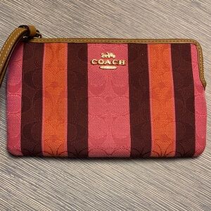 Coach signature Jacquard striped leather accent wristlet